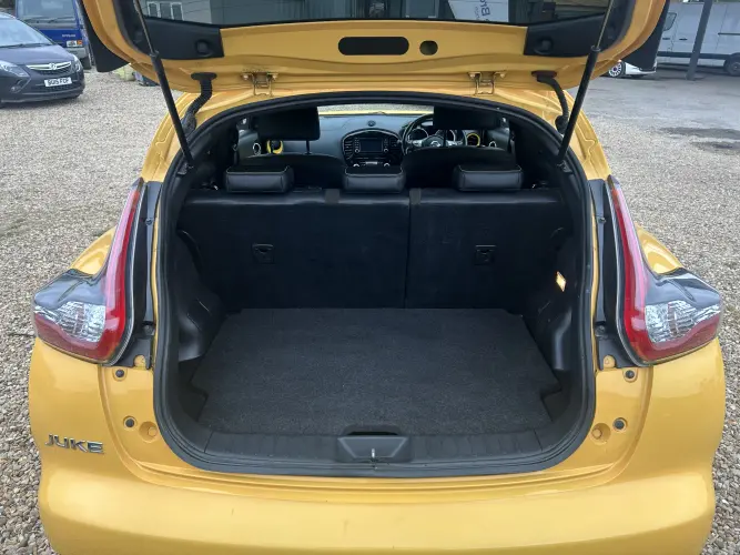 Angled front view with bag zipped and handles upright.