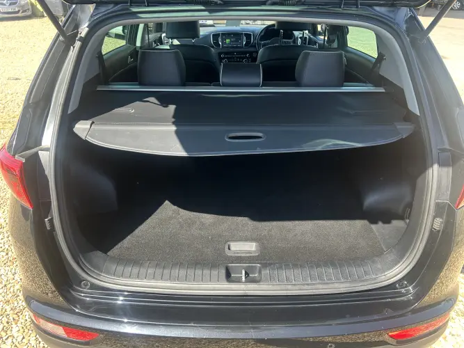 Angled front view with bag zipped and handles upright.