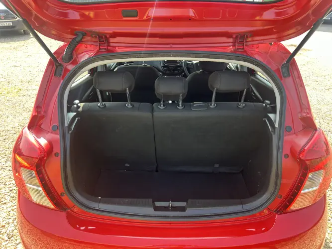 Angled front view with bag zipped and handles upright.
